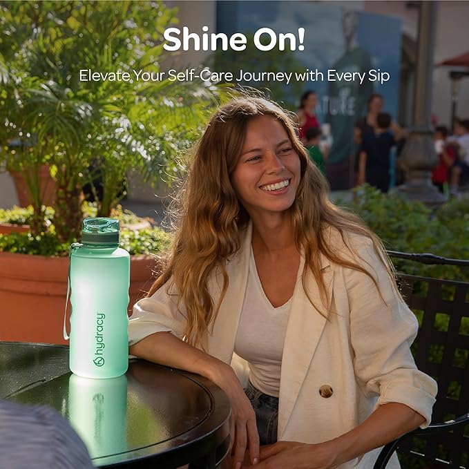 Hydracy Water Bottle with Time Marker -Large BPA Free Water Bottle & No Sweat Sleeve -Leak Proof Gym Bottle with Fruit Infuser Strainer & Times to Drink -Ideal for Fitness Sports & Outdoors