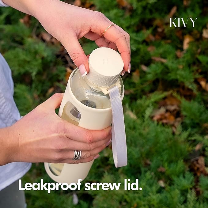 KIVY Glass Water Bottle with Silicone Sleeve 32 oz [WITH MEASUREMENT] - Borosilicate Glass Water Bottle Screw Top - Clear Bottles with Measurement Marking - Slim Waterbottle Aesthetic - Cream White