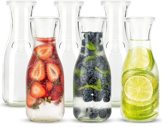Glass Carafe Pitchers, by Kook, Mini Carafes- set of 6, Beverage Dispensers, Clear Jugs For Mimosas, Water, Wine, Milk and Juice, with Plastic Lids, Dishwasher Safe 17.3 oz